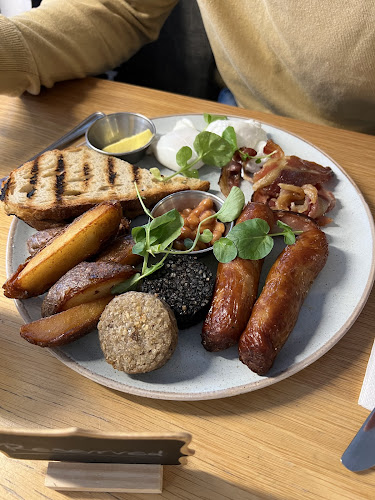 The Bookshelf at The Elysian - Hospitality and gastronomy