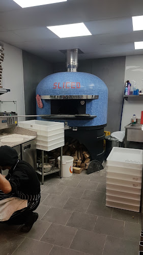 Sliced Wood Fired Pizza - Hospitality and gastronomy
