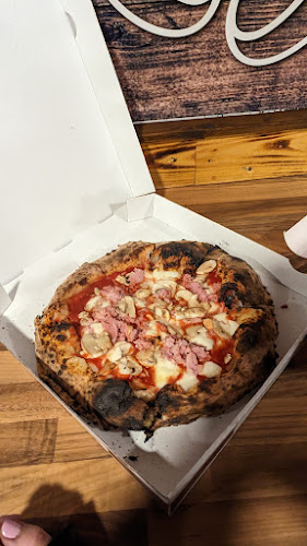 Sliced Wood Fired Pizza - Hospitality and gastronomy